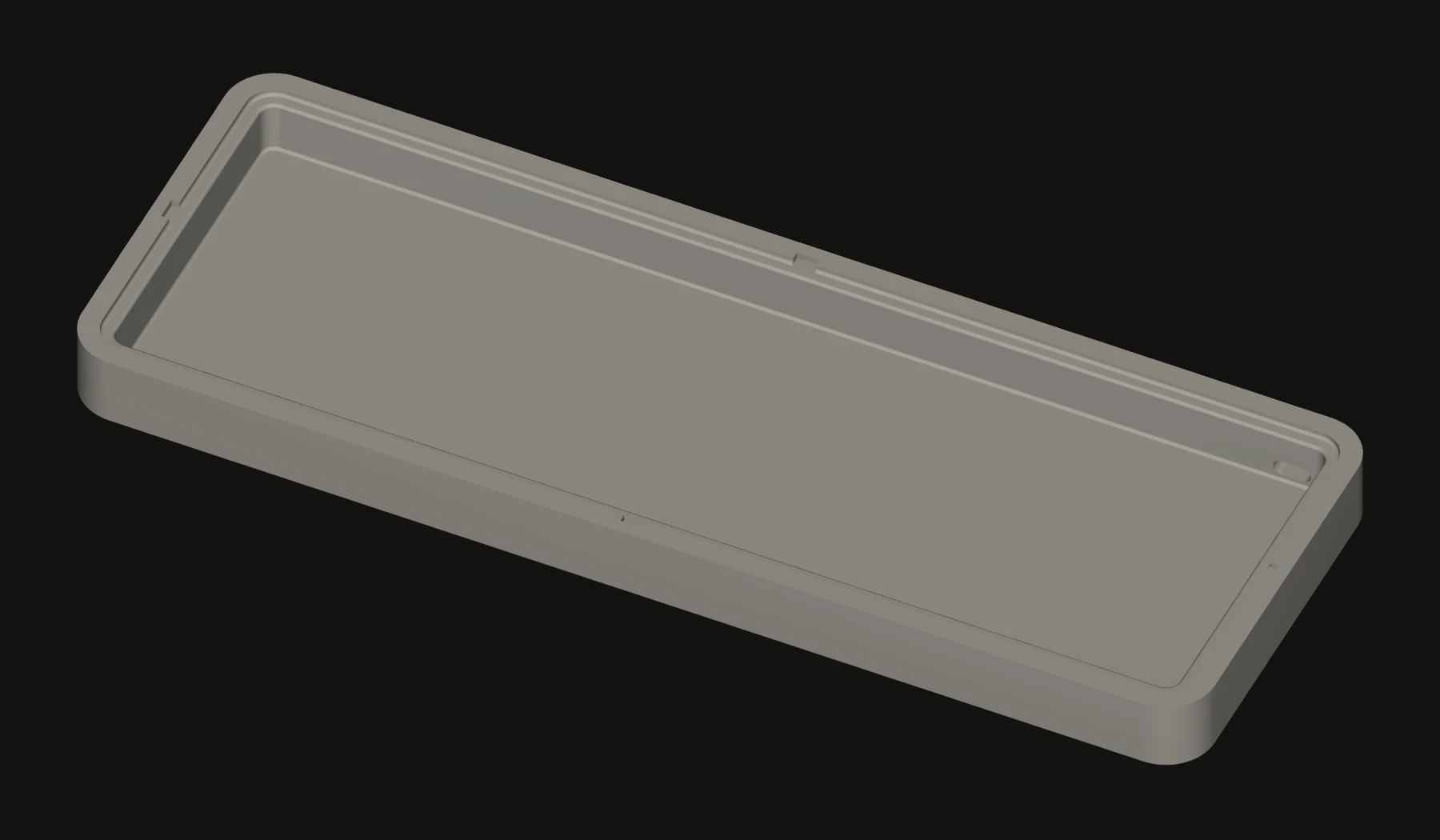 Current base geometry from the supplied STL. Incline angle, USB-C access, and display-window integration are still being refined.